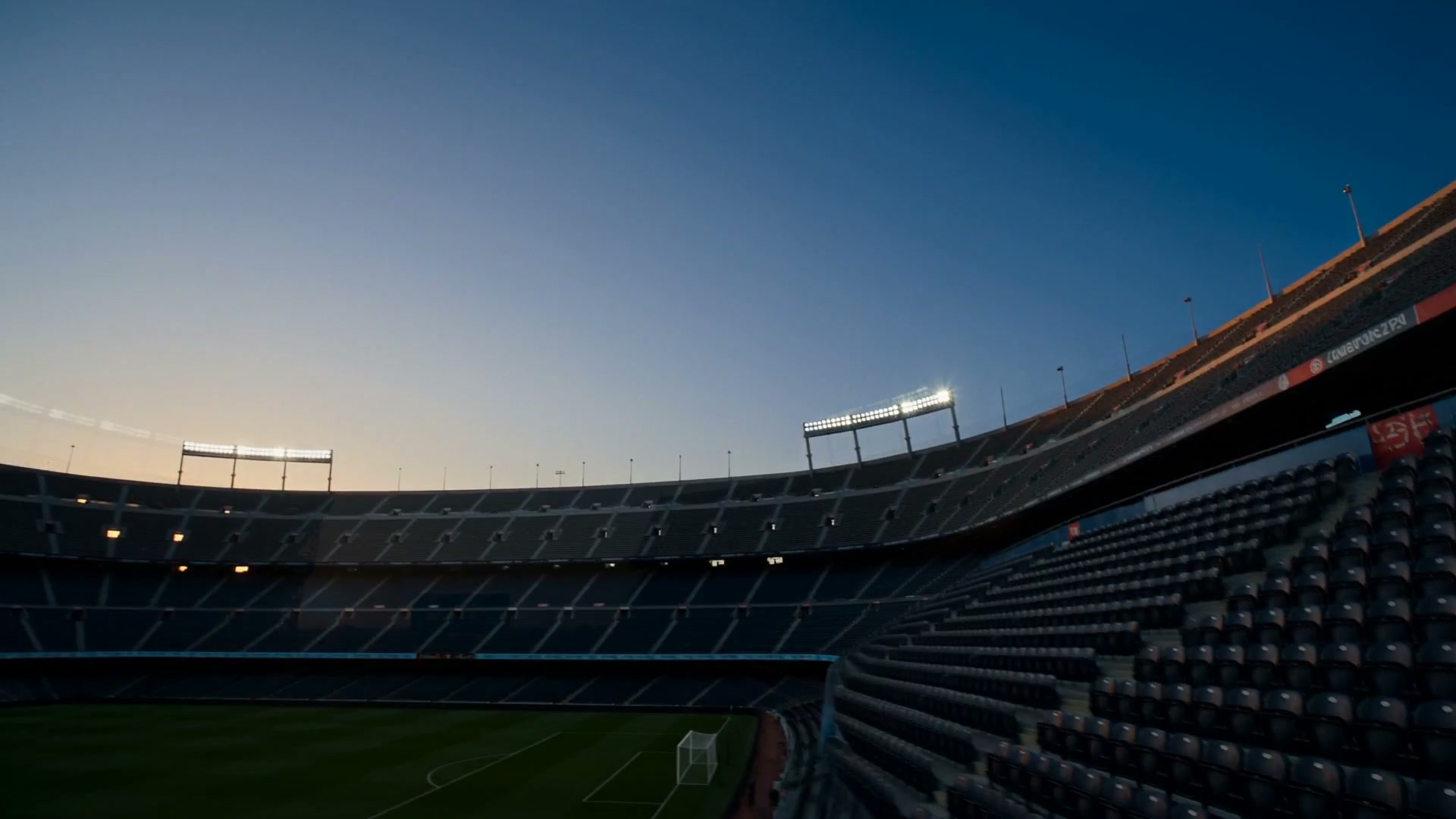 Stadium at dawn, where elite decisions are made under public scrutiny.