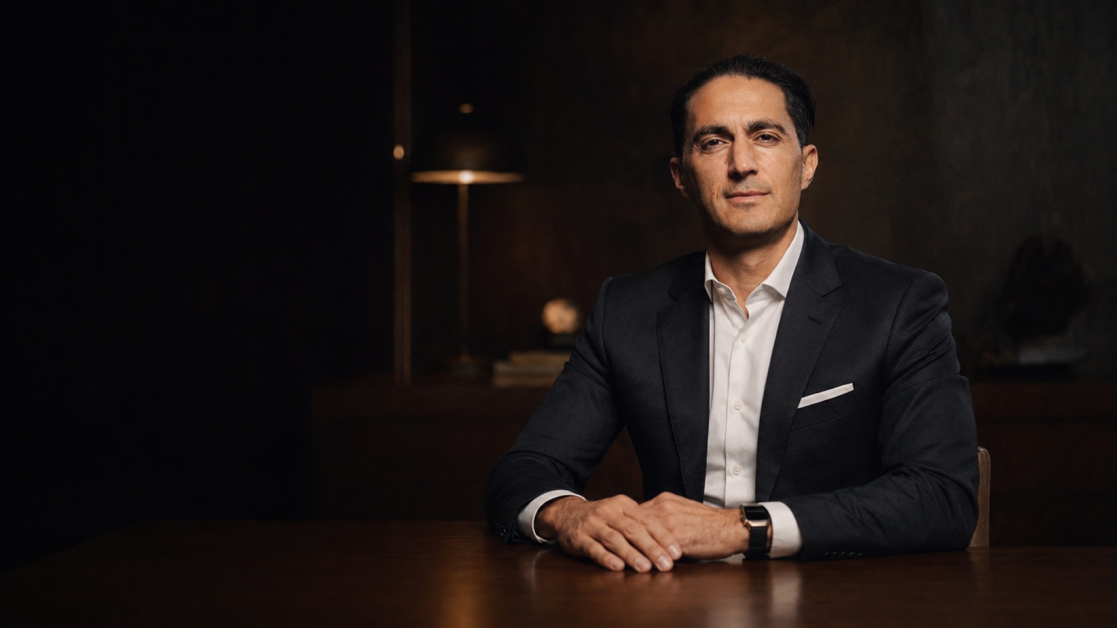 Serdar Gözübüyük seated in a quiet private room, composed and direct